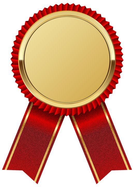 a red and gold award ribbon with a blank label