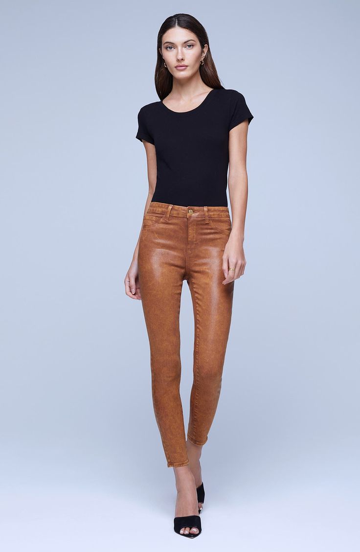 Coated for a sleek sheen, these skinny crop jeans with a high waist polish your look without any effort at all. 26" inseam; 10" leg opening; 10 1/2" front rise; 14 1/2" back rise (size 29) Zip fly with button closure Five-pocket style 86% cotton, 11% elastane, 3% spandex Spot clean only Made in the USA of Imported fabric Women's Clothing Sleek Bottoms With Five Pockets For Fall, Sleek High Rise Bottoms For Spring, Chic High Rise Brown Jeans, Trendy High Rise Leather Pants For Spring, Fitted Mid-rise Leather Pants For Spring, Sleek Slim Fit Bottoms For Spring, Trendy Mid-rise Leather Pants For Fall, Chic Slim Fit Jeans For Fall, Brown Jeans For Workwear In Spring