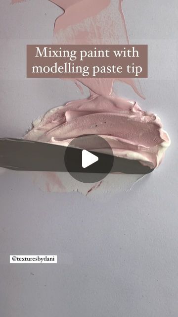 the video is showing how to paint with modeling paste