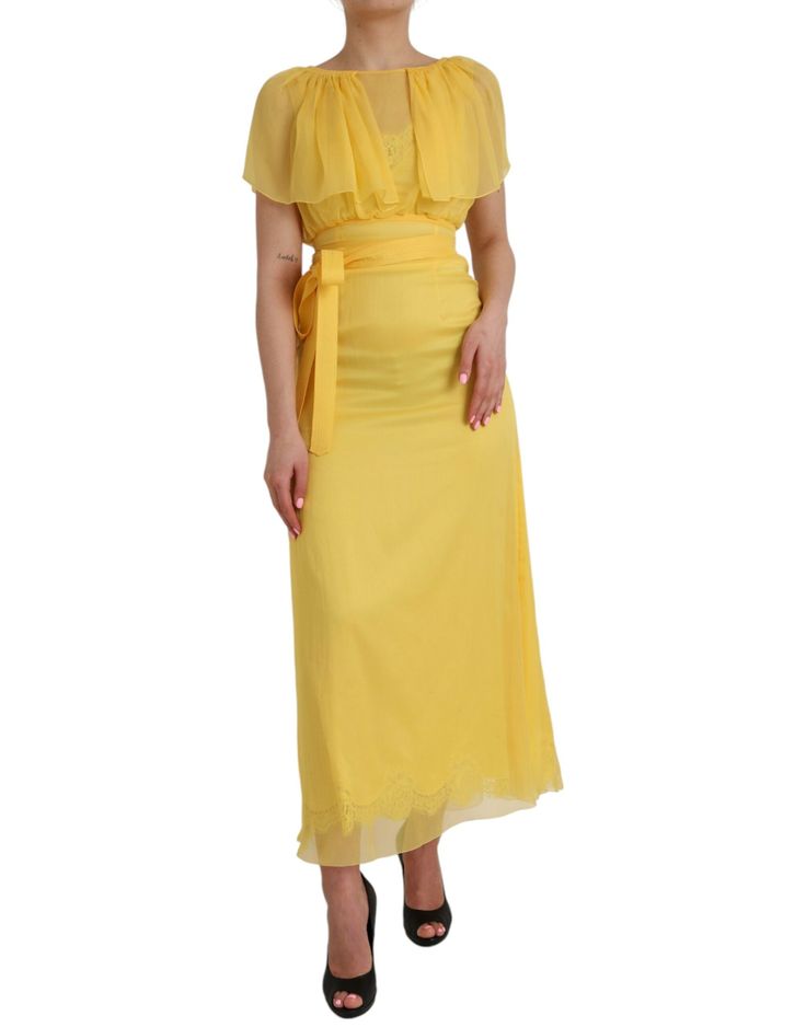 Dolce & Gabbana dresses are known for their elegant, sheer designs. This maxi dress features a zipper closure in the back and is made of 100% silk in a stunning yellow color. Made in Italy.   Model: Maxi dress  Color: Yellow  Materials: 100% Silk  Zipper closure  Made in Italy Elegant Yellow Floor-length Chiffon Dress, Yellow Silk Floor-length Evening Dress, Yellow Silk Maxi Dress For Gala, Chic Yellow Chiffon Midi Dress, Yellow Silk Evening Maxi Dress, Yellow Chiffon Floor-length Maxi Dress, Silk Chiffon Maxi Dress For Formal Occasions, Yellow Maxi Evening Dress For Summer, Elegant Yellow Maxi Chiffon Dress