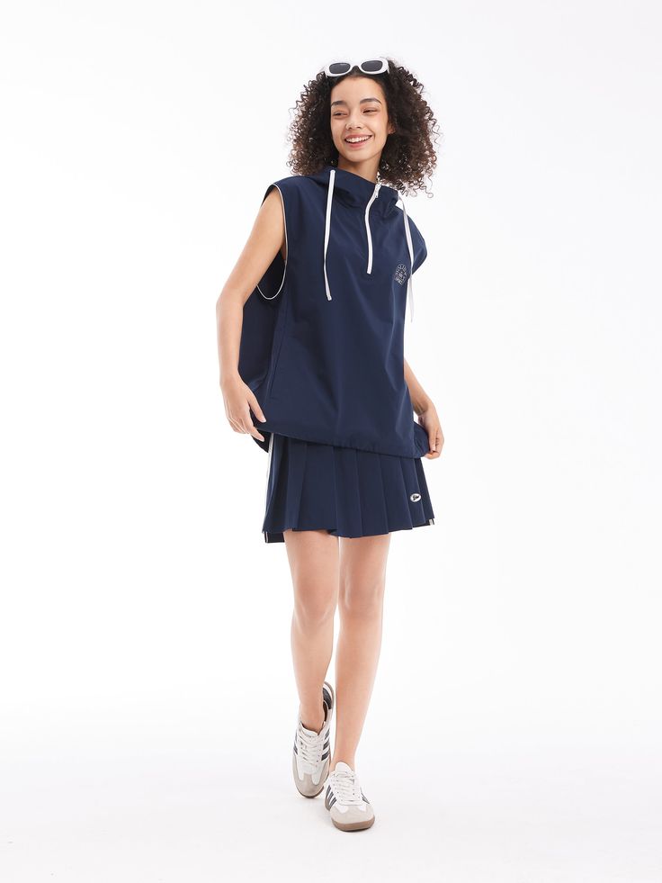 Details: Girly Pleated Skirt In NavyBuilt-in shorts for a discreet summer lookStriped webbing at the side for a vintage college look. Materials & Care: Fabric: Polyester 100%.Lining: nylon 92.4 %Spandex 7.6 % Hand wash | Dry clean Do not bleach Size & Fit: Model is 5'7", Bust 32, Waist 24, Hips 35, wearing a size S Item #: SN2SK10 Navy Sporty Skort For Summer, Navy Stretch Tennis Skirt For Summer, Casual Navy Tennis Skirt For Spring, Casual Knee-length Tennis Skirt For Summer, Casual Knee-length Summer Tennis Skirt, College Looks, Chic Business Casual, Denim Jean Dress, Textured Coat