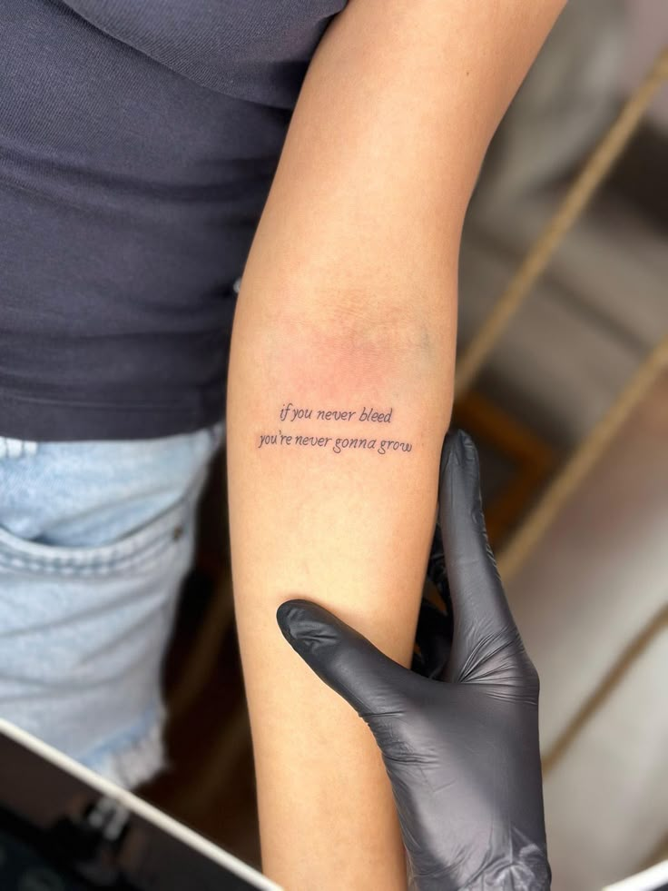 Discrete Taylor Swift Tattoos, Forever Growing Tattoo, Taylor Swift Clean Tattoo Ideas, Taylor Swift Back Tattoo, Small Tattoo Taylor Swift, Taylor Swift Tattoo Ideas Small Evermore, Taylor Swift Related Tattoos, Mine Tattoo Taylor Swift, The 1 Taylor Swift Tattoo