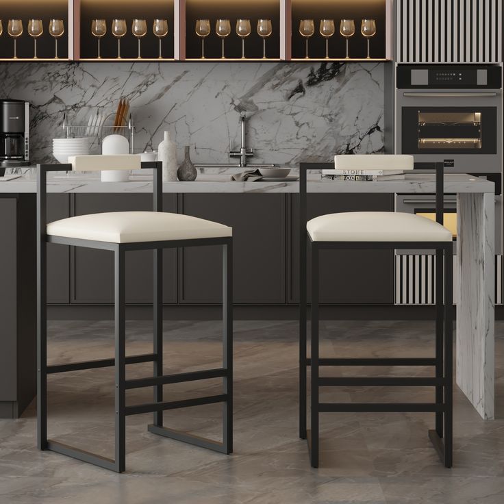 two white stools sitting in front of a marble counter top with wine bottles on it