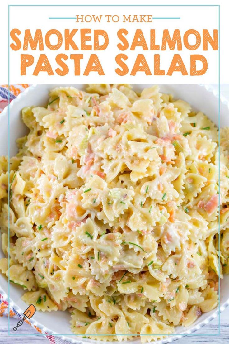 a bowl full of smoked salmon pasta salad with text overlay that reads how to make smoked salmon pasta