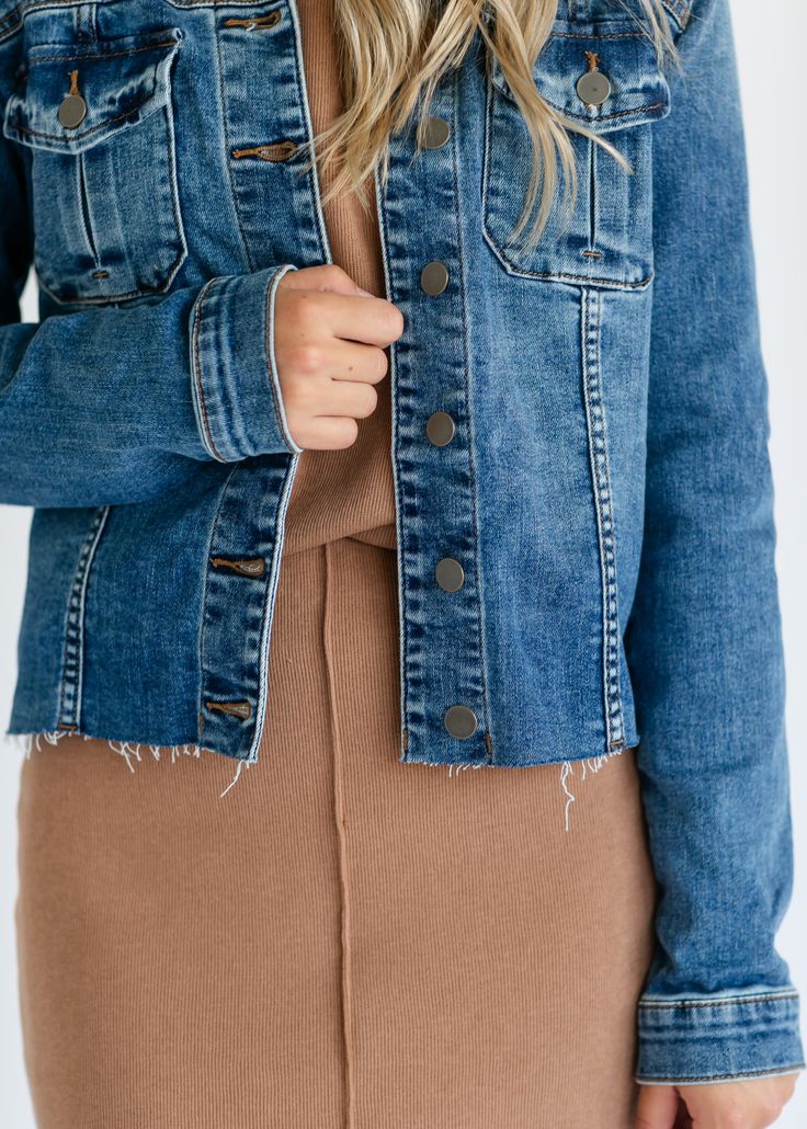 Add to your modest layering essentials with the Kara Dark Wash Denim Jacket by Kut from the Kloth! This casual-cool jean jacket is crafted in a perfectly faded dark blue wash that will go with all the things! It features two chest pockets, front seams, a full button front, and a raw hem. Crafted from a stretchy material with a classic fit you will love it layering over your favorite dress or top all season long! Style | Jackets, Denim Color | Blue SIZING TIPS Fit | Semi-Fitted Stretch | Mid-Stre Modest Layering, Layering Essentials, Dark Wash Denim Jacket, Overall Skirt, Jackets Denim, Professional Wardrobe, Church Dresses, Denim Color, Back To School Shopping