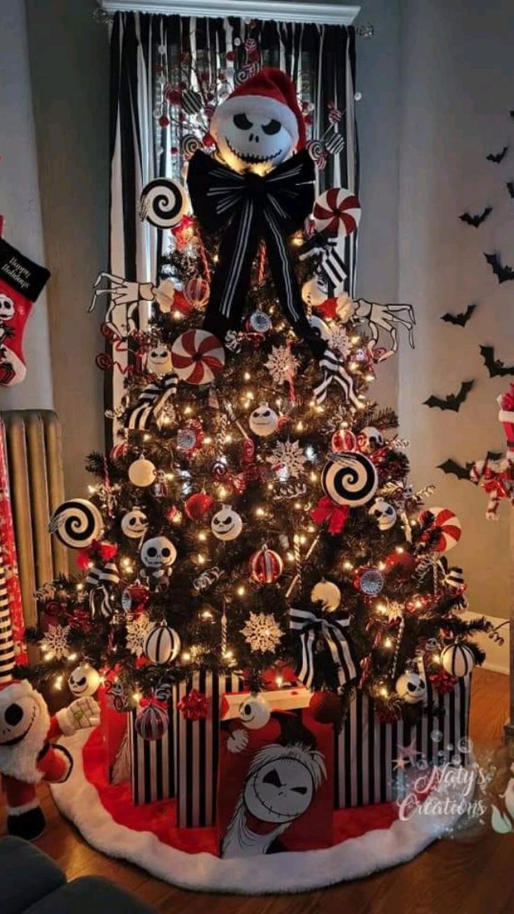 a christmas tree decorated with black and white ornaments