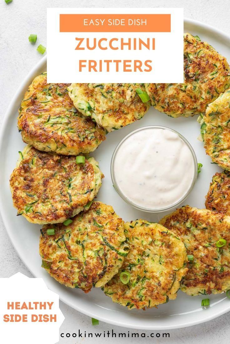 zucchini fritters on a plate with ranch dressing