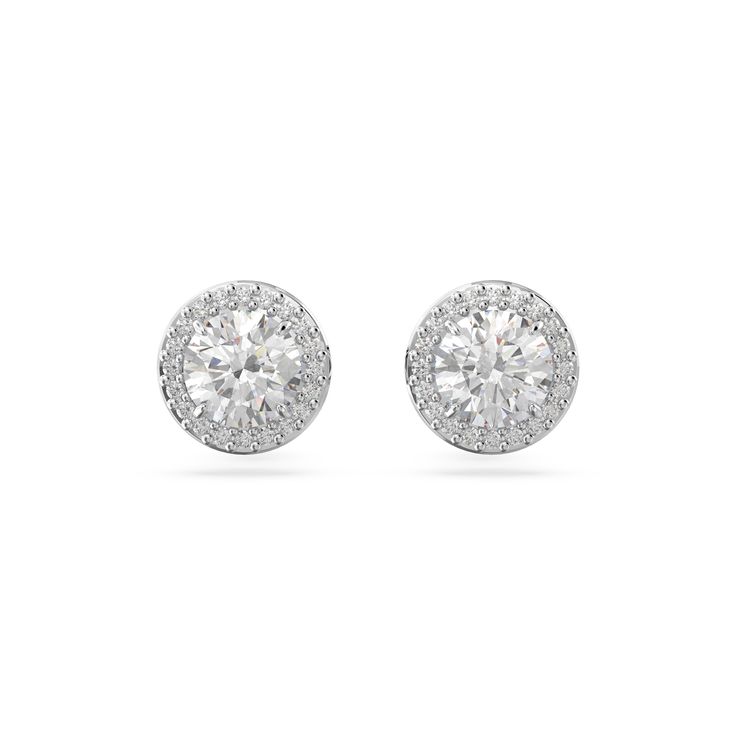 Get ready to shine in these mesmerizing stud earrings from Swarovski Crystal's Constella family. Showcasing clear stones that are illuminated with Swarovski's exquisite pave technique, this effortless pair is finished with a rhodium-plated setting. Instant wonder for every day. Measurements: 3/8 inch in diameter Weight (individual piece): 0.02 ounce Swarovski Crystal Style #: 5636269 Swarovski Earrings Studs, Round Diamond Earrings, Dazzling Earrings, Swarovski Crystal Jewelry, Halo Earrings Studs, Crystal Stud Earrings, Swarovski Earrings, Swarovski Jewelry, Large Earrings