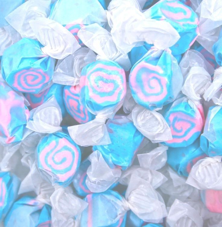 blue and pink candies with swirl designs on them