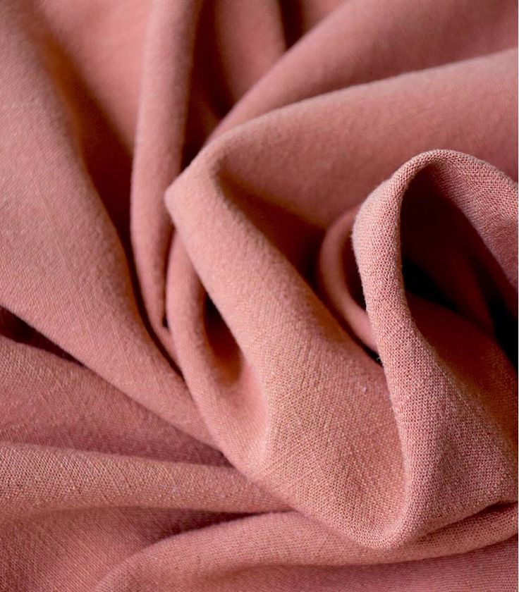 a close up view of a pink fabric