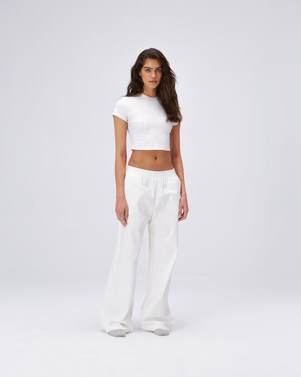 Cotton Pull on Pants - White High-waisted Cotton Bottoms For Loungewear, Cotton High-waisted Bottoms For Loungewear, Cotton Wide Leg Athleisure Bottoms, Wide Leg Cotton Pants With Ribbed Waistband, Sporty Cotton Straight Pants, Cotton Cargo Pants With Elastic Waistband, Cotton Straight Leg Athleisure Bottoms, Cotton Athleisure Straight Leg Bottoms, Cotton High-waisted Pants For Loungewear