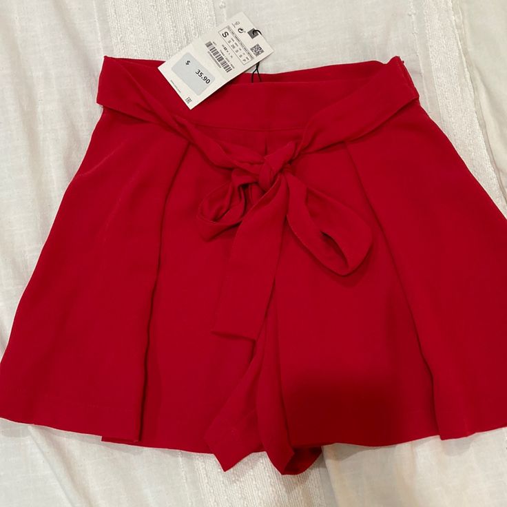 Zara Red Dress Shorts. Never Worn. Side Zip At Waist. Fits True To Size And Sits Mid/High Rise On Waist (Hits Right Above My Belly Button). Size Small. Solid Summer Party Shorts, Solid Color Party Shorts For Summer, Casual Solid Color Shorts For Party, Red High Waist Bottoms For Going Out, Casual Mini Bottoms For Going Out, Spring Party Shorts In Solid Color, Casual Mini-length Bottoms For Going Out, Chic Red Bottoms For Going Out, Elegant Red Summer Bottoms