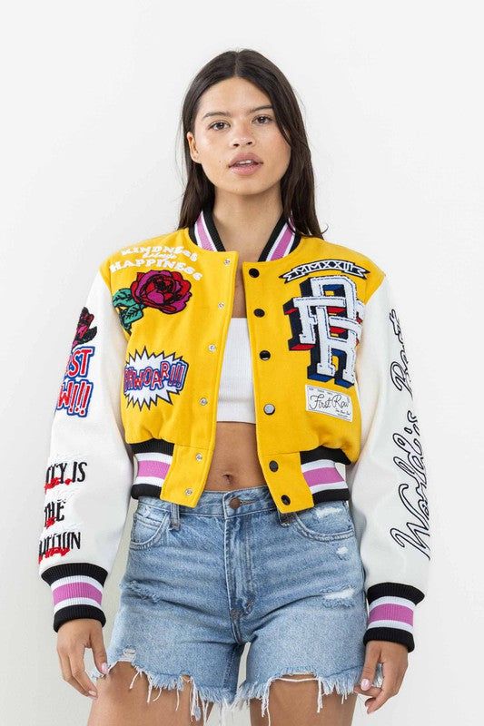 Spring Varsity Jacket With Long Sleeves, Spring Long Sleeve Varsity Jacket, Spring White Patchwork Varsity Jacket, Spring Fitted Varsity Jacket, Spring Varsity Jacket With Patchwork, Patchwork Varsity Jacket For Spring, Spring College Outerwear With Patches, Spring Patchwork Varsity Jacket, Fitted Varsity Outerwear For Spring