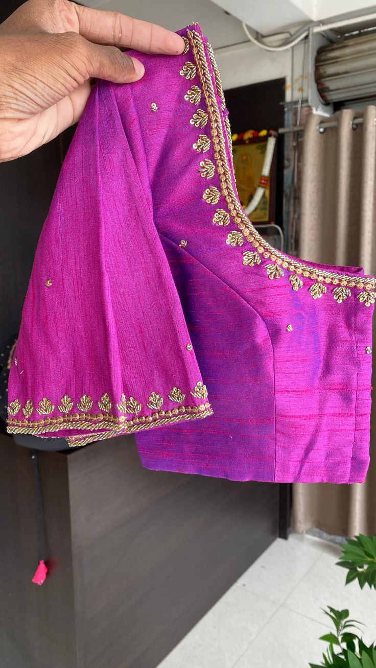 Product Descriptions : Magenta silk blouse comes with heavy jewel type hand work for front, back & sleeves as shown Raw Silk Embroidered Top For Diwali, Designer Cutdana Embroidered Top, Designer Silk Blouse With Resham Embroidery, Tissue Silk Blouse With Cutdana For Receptions, Tissue Silk Cutdana Blouse For Receptions, Cutdana Tissue Silk Blouse For Receptions, Bollywood Cotton Silk Blouse For Reception, Cotton Silk Blouse For Diwali Reception, Bollywood Style Cotton Silk Blouse For Reception