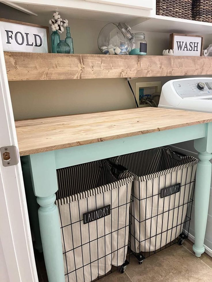 the laundry room is clean and ready to be used as a storage space for clothes