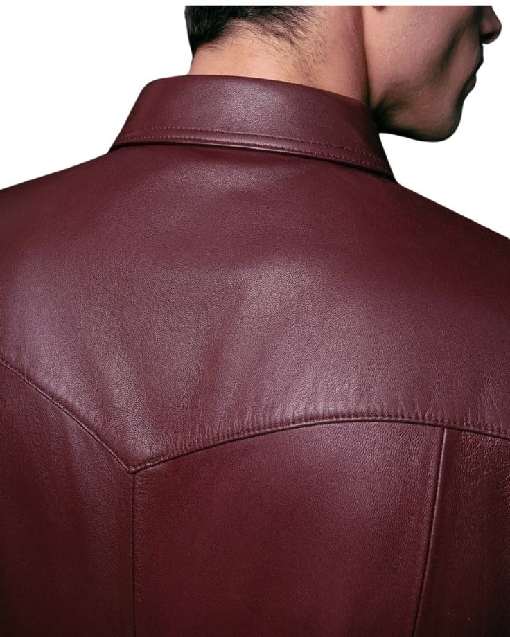 Improve your style with our expertly crafted Dark Red Leather Shirt, a true testament to timeless sophistication. Meticulously designed by our master artisans with over 50 years of experience, this shirt is the essence of rugged elegance. Featuring intricate pocket stitching and metal snap buttons, it exudes a distinctive charm that will have heads turning and conversations starting. The pointed collar and western yoke lend an air of old-world sophistication, while the supple, 100% sheepskin lea Classic Fitted Leather Tops, Fitted Classic Leather Top, Fitted Classic Leather Tops, Classic Collared Leather Shirt, Luxury Collared Shirt For Fall, Burgundy Shirt For Fall Workwear, Classic Long Sleeve Leather Tops, Burgundy Fall Workwear Shirt, Luxury Spread Collar Shirt For Fall