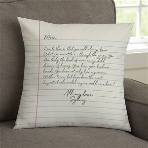 a pillow that has writing on it