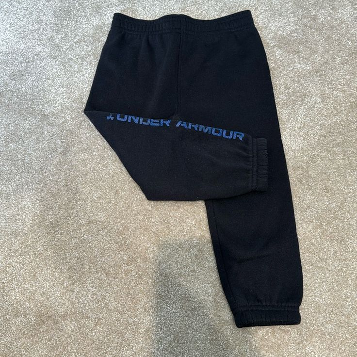 Never Worn 18 Mo Under Armour Black Sweatpants For Sports, Black Casual Under Armour Sweatpants, Black Sporty Sweatpants By Under Armour, Under Armour Black Sweatpants With Pockets, Under Armour Black Pants With Pockets, Under Armour Black Cotton Bottoms, Under Armour Black Pants With Elastic Waistband, Black Sweats, Black Sweatpants