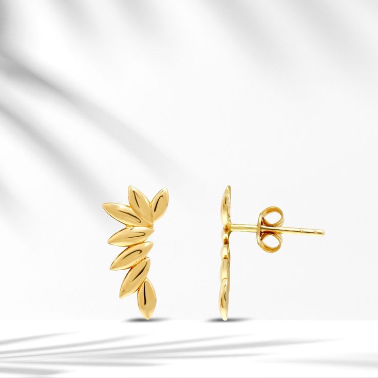 🌿 8k/14k/18k Solid Gold Laurel Earrings,Minimal Branch Cartilage Earring,Tiny Leaves Helix Stud,Conch Earring,Leaf Tragus Flat Back Earring 🌿 It is a perfect Valentine's Day gift, anniversary gift, gift for a woman, a gift for a grandmother. 🌿May laurel leaves be the decoration of your ears. 🌿  Details of the Product: Weight: Approximately 1,60 gr - Earrings are complementary pieces that transform plain looks into stylish combinations.  - All of our products are handmade produced of 8K, 14K, 18K real gold. The certificates of the diamonds we use in our products will be delivered by the cargo together with your orders. - Make sure you choose the right size and color before completing your order. If there is a preference you want to change, please contact us via message before your order Dainty Yellow Gold Ear Climbers For Pierced Ears, 14k Gold Ear Climbers As Fine Jewelry Gift, Delicate Gold Cartilage Earrings With Ear Wire, Tarnish Resistant Yellow Gold Ear Climbers For Gift, Delicate Gold Ear Climbers As Gift, Fine Jewelry Yellow Gold Ear Climbers As Gift, Delicate Gold Pierced Ear Climbers, 14k Gold Ear Climbers As Gift, Delicate Gold Ear Climbers For Gift