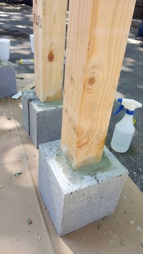 two cement blocks are stacked on top of each other