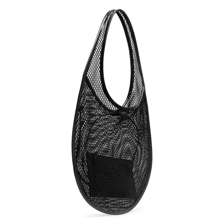 Black mesh shoulder bag from Alaïa. The One piece medium hobo bag is made of black fishnet and patent leather, with a drawstring top and patent leather pouch to fit all your belongings.Measurements: L26 x H39 x W1 cmMade in Italy Fishnet Bag, Black Woven Leather Hobo Bag For On-the-go, On-the-go Hobo Bag With Metal Hardware, Black Textured Leather Hobo Bag For On-the-go, Alaia Bag, Black Fishnets, Drawstring Top, Black Bag, Black Mesh