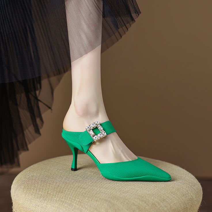 Elegant and stylish mules that offer you an effortless chic look. Upper: Genuine Leather Lining: Genuine Leather Outsole: Rubber Toe Shape: Pointy Toe Heel: 6.5cm/2.5'' Closure: Slip on Fashion Element: Square Rhinestone Decoration is_handmade: Yes Elegant Green Slip-on Mules, Chic Green Mules For Evening, Chic Green Mules For Formal Occasions, Elegant Green Mules For Evening, Green Spring Formal Mules, Green Pointed Toe Mules With Padded Heel, Green Slip-on Evening Heels, Green Evening Slip-on Heels, Slip-on Heels With Buckle Closure For Party