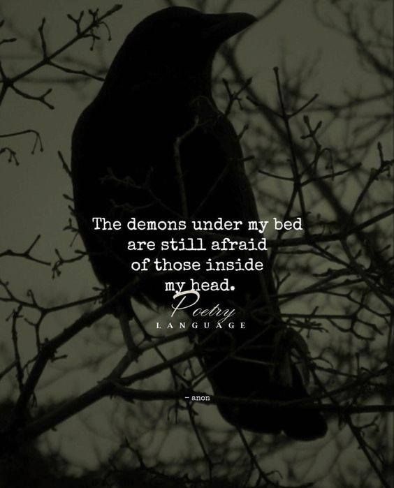 a black bird sitting on top of a tree branch with a quote about the demons under my bed