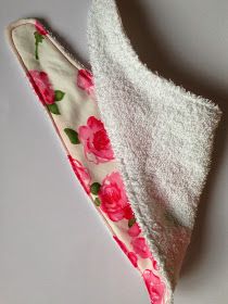 two pieces of cloth with pink flowers on them