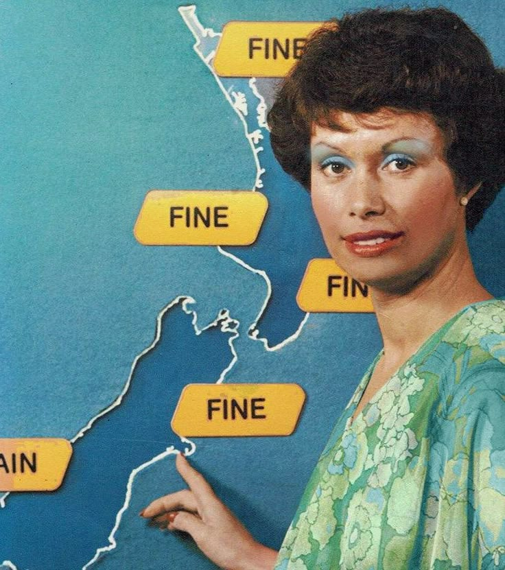 a woman standing in front of a map with the words fine, fine and finn