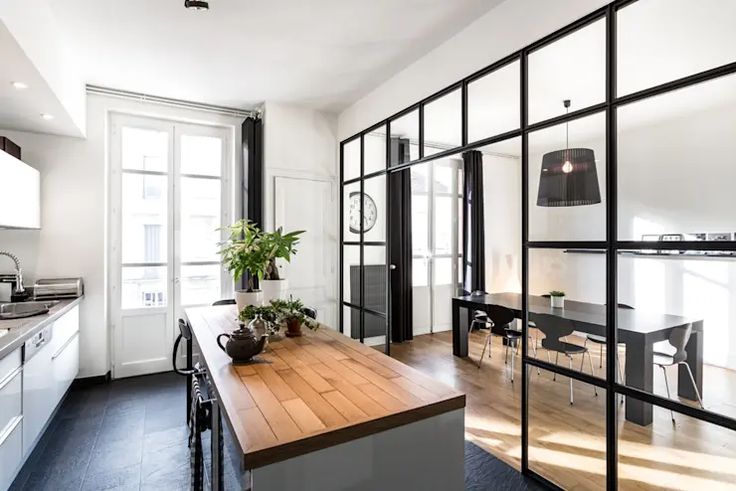 the kitchen is clean and ready to be used as a dining room or office space