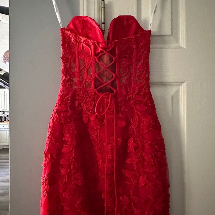 Size 00 Sherry Hill Dress. Like Brand New; Wore For Hoco Dance For A Couple Hours. No Alterations. Red Lace Dress With Sweetheart Neckline, Red Lace Dress With Fitted Bodice, Red Lace Evening Dress With Fitted Bodice, Red Evening Dress With Sweetheart Neckline For Cocktail, Red Cocktail Evening Dress With Sweetheart Neckline, Red Sweetheart Neckline Evening Dress For Cocktail, Red Lace Dress For Gala, Red Cocktail Gown With Fitted Bodice, Cocktail Red Gown With Fitted Bodice