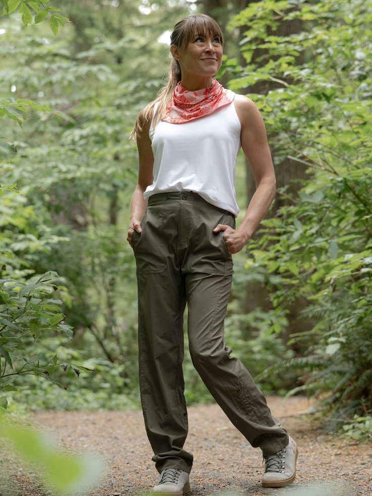 Introducing our quick-dry Travel Pant with drawstring closure and adjustable length – the ultimate companion for your adventures near and far! Whether you're running through the airport, trekking through the wilderness, or simply seeking comfort, these versatile pants are designed to keep you stylish while on the move. Quick-Dry | Our travel pants are crafted from a moisture-wicking fabric that ensures you stay dry and comfortable. Closure | The drawstring closure at the waist with a zipper fly Travel Pant, Closet Basics, Waterproof Pants, Travel Pants, Sports Skirts, The Wilderness, Moisture Wicking Fabric, Dress Fabric, Trekking