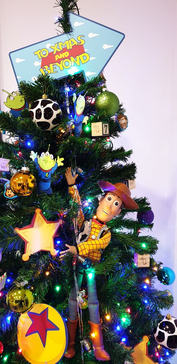 the toy story tree is decorated with toys