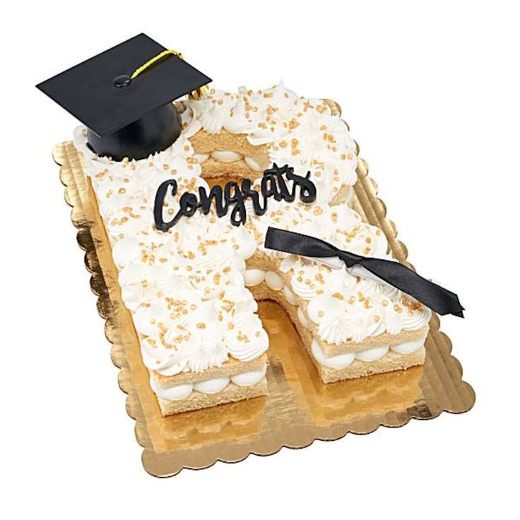 a graduation cake with congratulations written on it