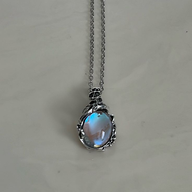 Beautiful New Oval Iridescent Stone In A Silver Ornate Setting On A 22” Adjustable Chain. Opalite Necklace, Cute Animal Quotes, Mood Stone, Boy Celebrities, Layered Necklaces Silver, Crystal Necklaces, Pretty Stuff, Stone Pendant Necklace, Moonstone Necklace