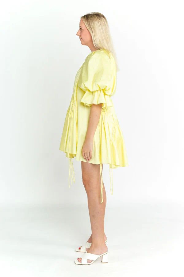 This gorgeous little dress by Aje is perfect for a special occasion or event. This style features Aje's signature voluminous sleeves and asymmetric hemlines in a summery lemon-hue. Pair it with low white heels for a formal look or sneakers for a casual setting. This style runs large so we recommend choosing one size down. Perfect for race days, weddings, vineyards, birthdays and daytime events. Mini length Intricately gathered Asymmetric neckline and hem Signature Aje voluminous sleeve Fully lined Low White Heels, Voluminous Sleeves, Asymmetric Dress, Asymmetric Neckline, Cardigan Sweater Jacket, White Heels, Gothic Dress, Dress 16, Crop Top Blouse