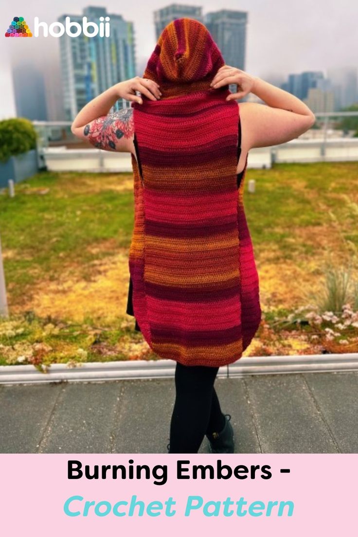 a woman wearing a red and orange striped sweater with the words burning embers crochet pattern