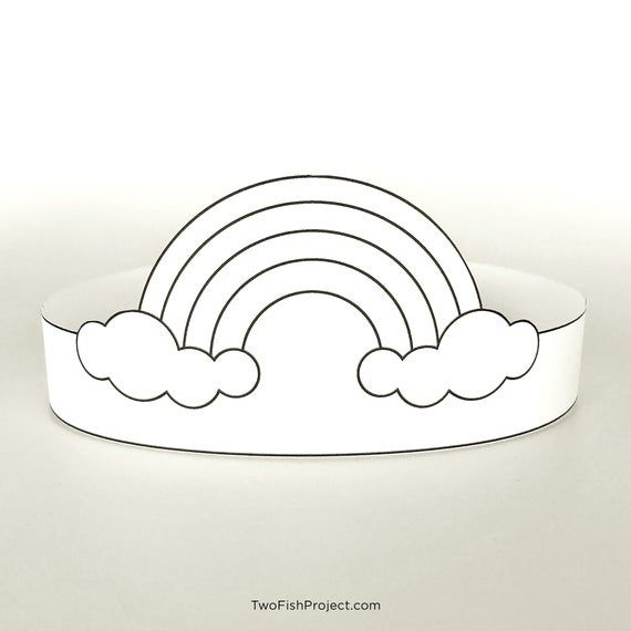 a paper cut out of a rainbow and clouds