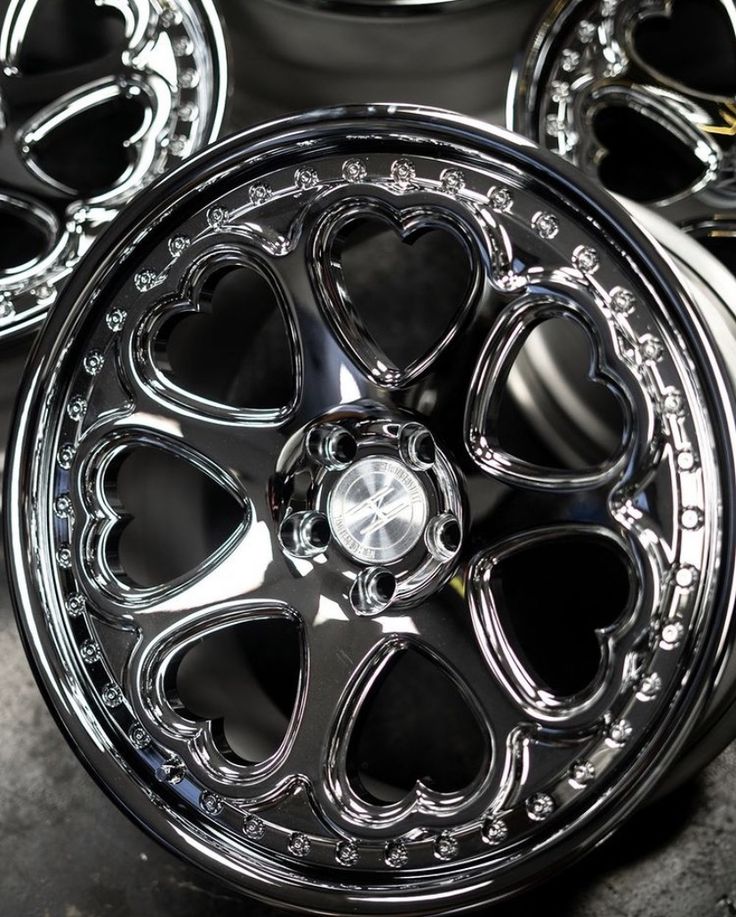 chrome wheels with hearts on them are shown