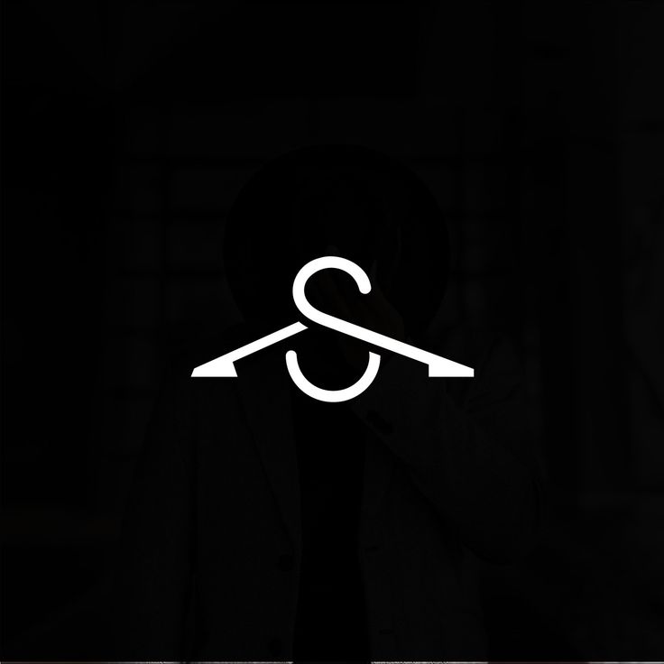 a black and white logo with the letter s in it's center, on a dark background