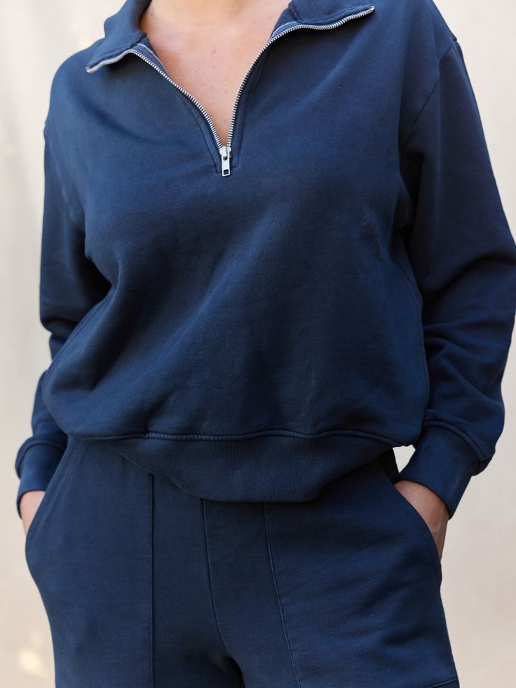 Made with 100% Organic Cotton, the Fleece Half-Zip Sweatshirt features ribbed cuffs and waistband, pockets, and a zippered collar that can be worn up or down. Perfect for layering on a crisp day or lounging at home. - 100% Organic Cotton - Machine wash cold with like colors - Tumble dry low - Do not bleachPlease note t Half-zip Sweatshirt With Pockets For Loungewear, Loungewear Half-zip Sweatshirt With Pockets, Half-zip Sweatshirt With Zipper For Loungewear, Half-zip Sweatshirt With Zipper Closure For Loungewear, Casual Half-zip Sweats For Loungewear, Half-zip Loungewear Tops, Cozy Half-zip Sweatshirt With Ribbed Cuffs, Cozy Half-zip Top With Ribbed Cuffs, Sporty Zipper Sweatshirt For Loungewear