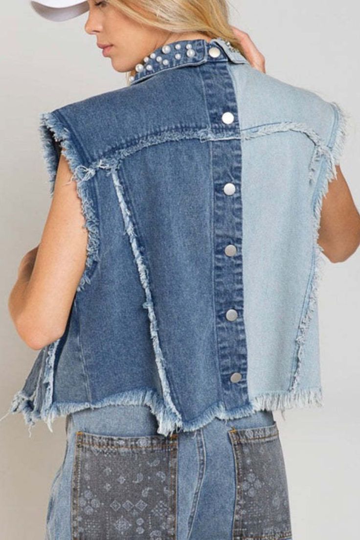 Introducing the Pearl Raw Hem Sleeveless Denim Jacket, the perfect addition to your wardrobe for a stylish and edgy look. Made with a blend of 65% cotton and 35% polyester, this jacket offers comfort and durability. The raw hem adds a unique touch to the classic denim jacket design. But what sets this jacket apart is its fast delivery. With our efficient shipping process, you can have this jacket in your hands in no time. No more waiting weeks for your order to arrive. We understand the importan Trendy Sleeveless Denim Top For Fall, Trendy Denim Vest Top For Fall, Trendy Fall Denim Vest Top, Trendy Denim Blue Vest Outerwear, Trendy Blue Sleeveless Outerwear, Trendy Sleeveless Denim Jacket For Summer, Trendy Spring Denim Vest Top, Edgy Sleeveless Denim Vest For Fall, Trendy Sleeveless Medium Wash Denim Jacket