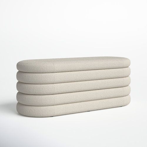 four white pillows stacked on top of each other