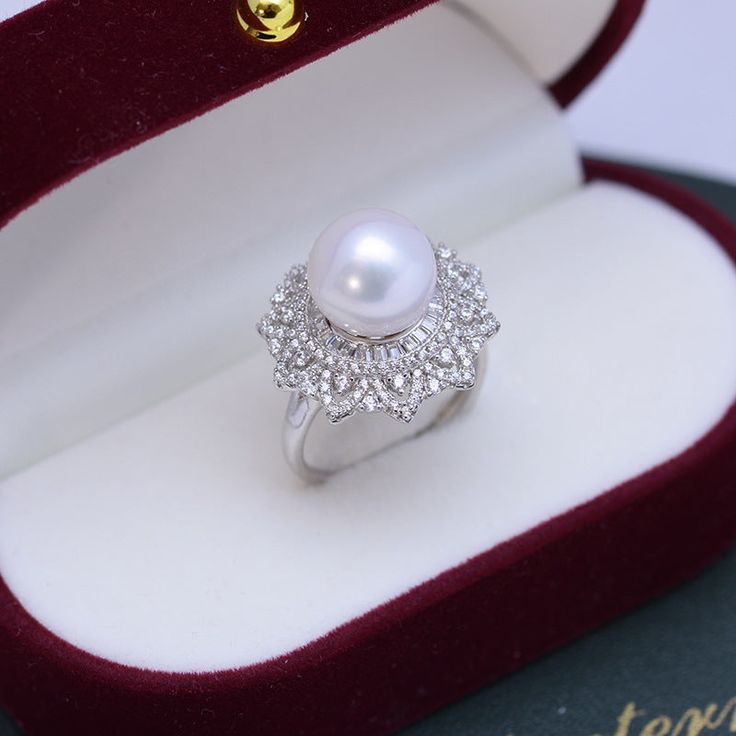 Get dressed up with our 10-11mm Freshwater Pearl & Round Cubic Zirconia. It has the perfect combination of elegance and style. The freshwater pearl creates a timeless look that makes this piece an ideal choice for any outfit. The round cut Cubic Zirconia add just the right amount of sparkle and shine to the overall design. This ring is perfect for special occasions or everyday wear, so you can show off your glamourous side no matter where you go. 10-11mm Freshwater Pearl Earrings This popular ea Button Pearl Earrings, Baroque Pearls Necklace, Popular Earrings, Pearl Rings, Freshwater Pearl Earrings, Baroque Pearl Earrings, Purple Pearl, Gold Pearl Necklace, Gold Pearl Earrings