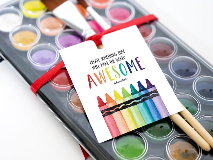 there is a card that has some paint in it and the words awesome are written on it