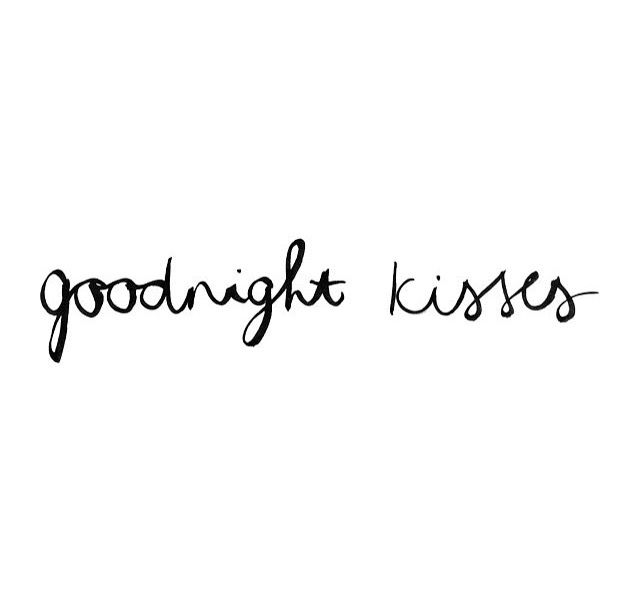 the words goodnight kisses written in black ink