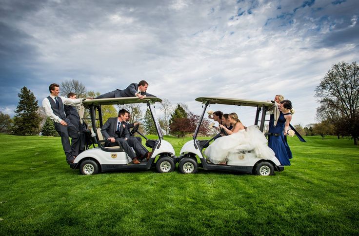 the bride and grooms are getting ready to ride in their golf carts on the grass