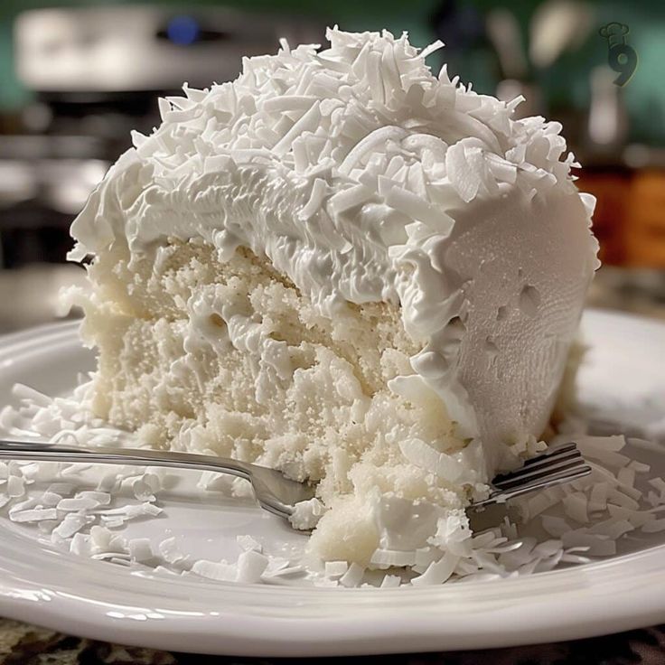 a piece of cake on a plate with a fork