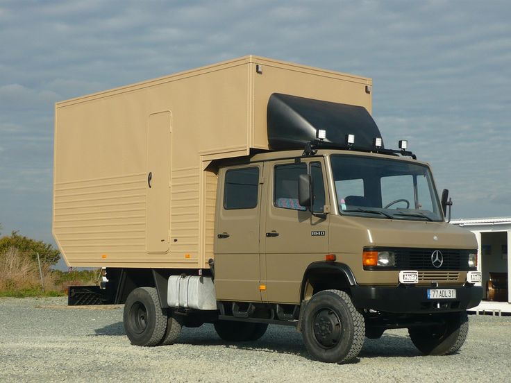 an army truck with a box on the back