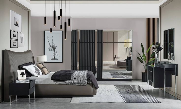 a modern bedroom with black and white decor